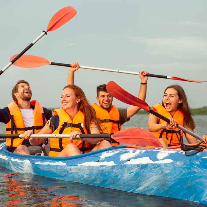 A group of having fun canoeing