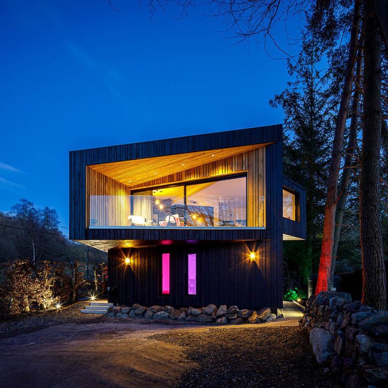 A Loch Venachar Lodge lit up at night