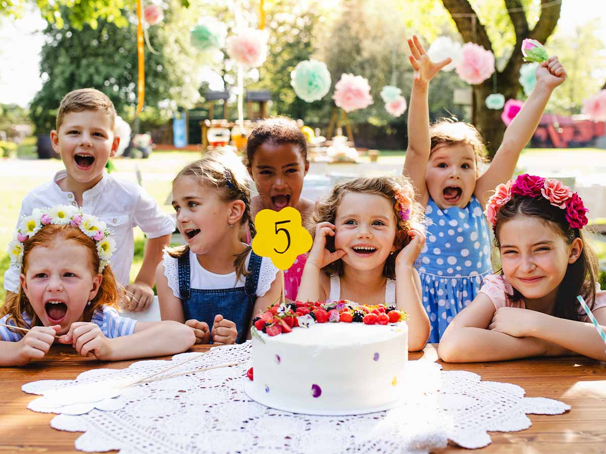 Children celebrating a 5th birthday party