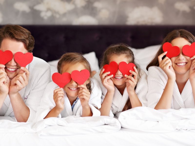 Family with valentines hearts
