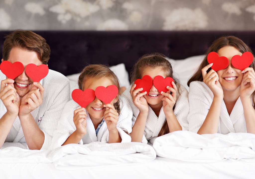 Family with valentines hearts