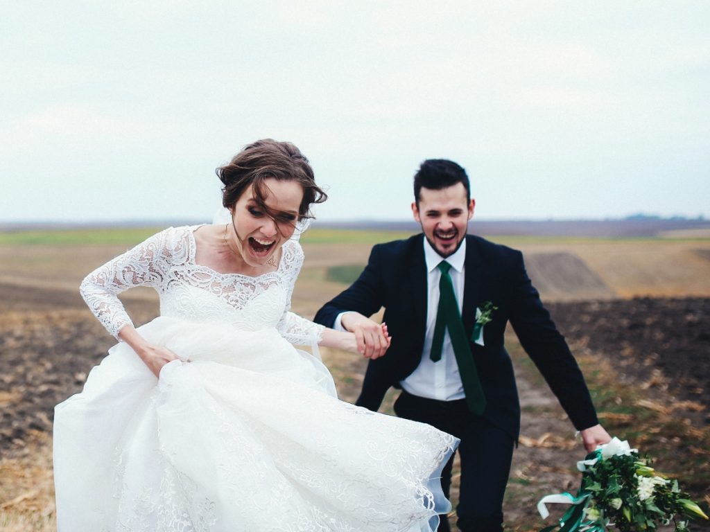 Happy couple running