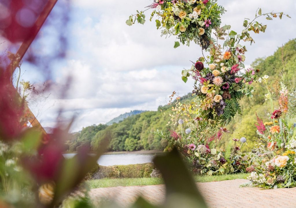 Photo of Loch Venachar with wedding flowers in the foreground