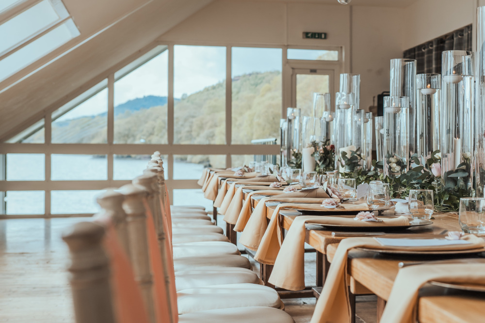Tables set up for dining with views of Loch Venachar