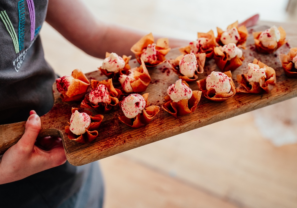 Delicious food on a rectangular wooden platter