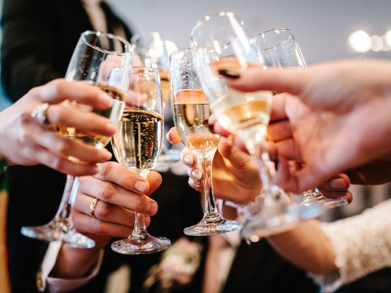 Guests drinking champagne at a lunch event