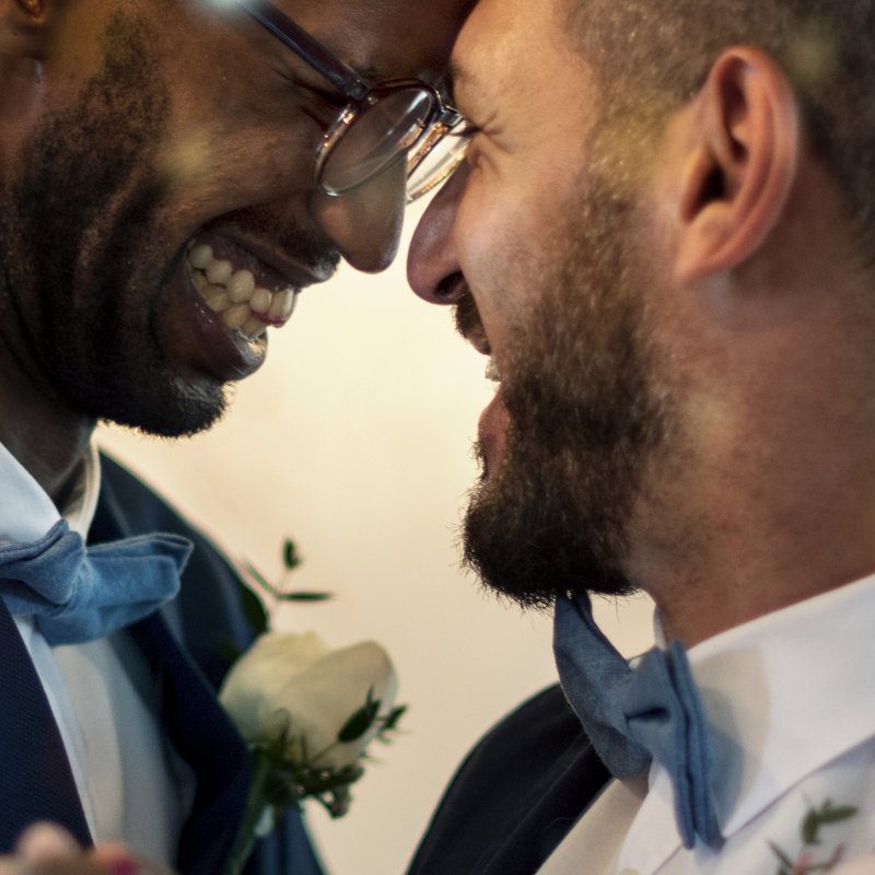 Two grooms dancing on their wedding day